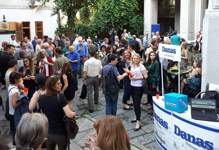 Community members celebrate Danas's successful online membership campaign in Serbia.