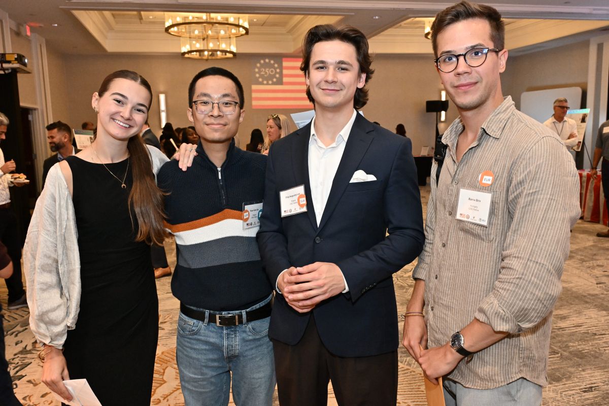 Photo of four fellows smiling