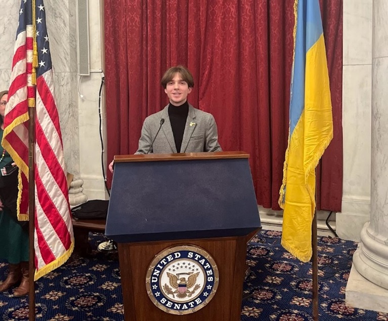 Rashyd standing in front of U.S. senate podium 